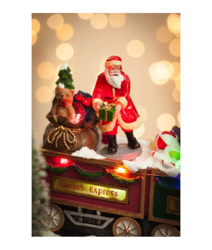 Boutique de Noël Animated And Musical Pieces*Table Ornament, Musical Train, With Santa And Elves. Measures 15 Inches.
