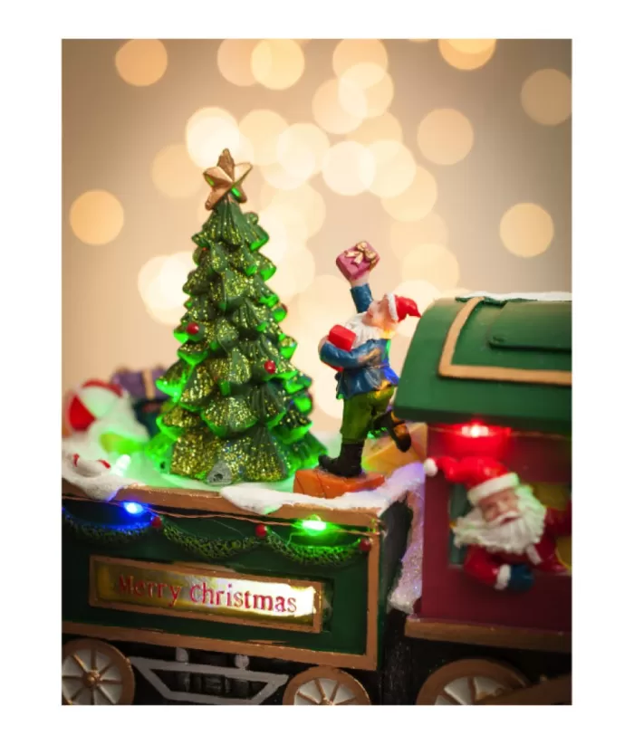 Boutique de Noël Animated And Musical Pieces*Table Ornament, Musical Train, With Santa And Elves. Measures 15 Inches.