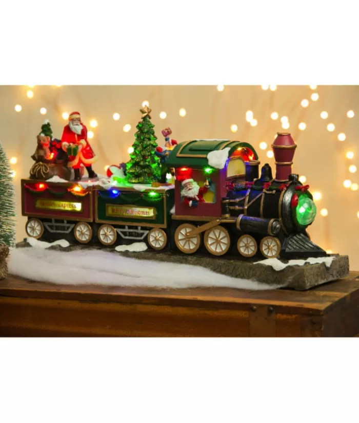 Boutique de Noël Animated And Musical Pieces*Table Ornament, Musical Train, With Santa And Elves. Measures 15 Inches.