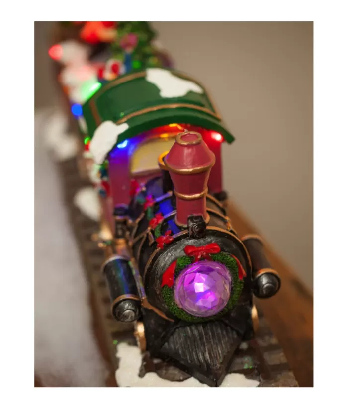 Boutique de Noël Animated And Musical Pieces*Table Ornament, Musical Train, With Santa And Elves. Measures 15 Inches.