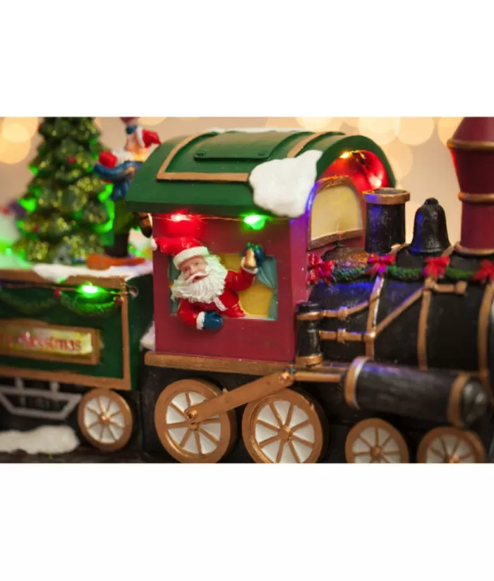 Boutique de Noël Animated And Musical Pieces*Table Ornament, Musical Train, With Santa And Elves. Measures 15 Inches.