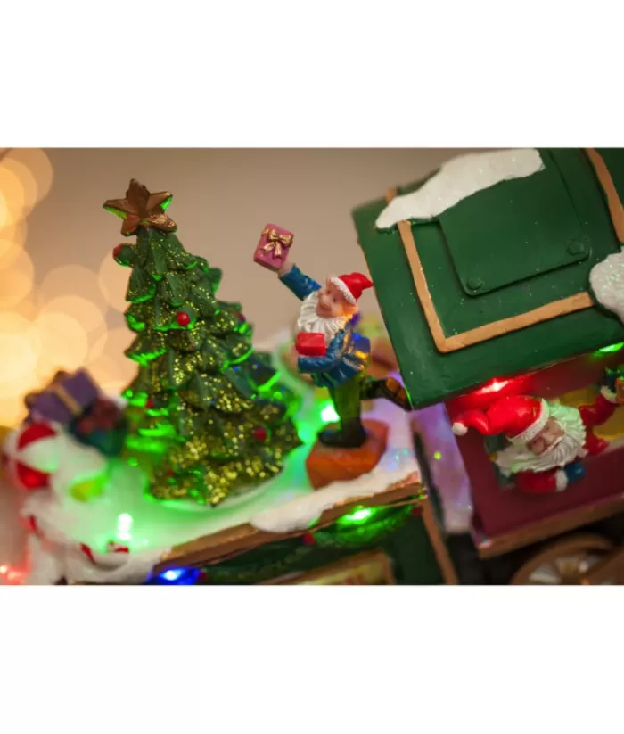 Boutique de Noël Animated And Musical Pieces*Table Ornament, Musical Train, With Santa And Elves. Measures 15 Inches.